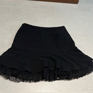 zara black mini skirt with lace in the botton